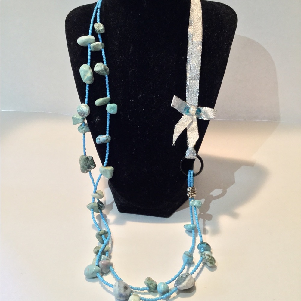Turquoise necklace with silver accent ribbon